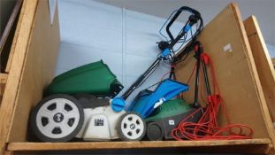 Electric lawnmower and a scarifier