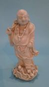 A Blanc De Chine figure of Buddha. 14.5cm high