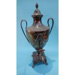 An impressive silver George III tea urn, James Young, London 1777, on square feet, the body