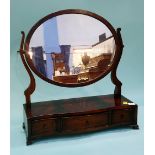 A mahogany serpentine fronted toilet mirror