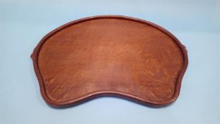 A Robert 'Mouseman' Thompson of Kilburn shaped oak tray, with two carved mice to the sides. 43cm