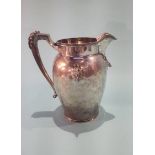 A Continental 'Sterling' jug mounted with deer's heads etc. approx. 22 oz