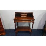 A reproduction mahogany desk, 65cm wide