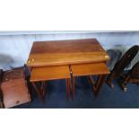 A Mackintosh teak fold over nest of tables