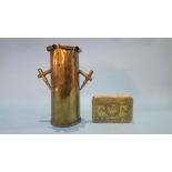 A brass World War I Christmas tin, 1914 and a brass shell