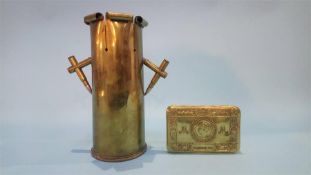 A brass World War I Christmas tin, 1914 and a brass shell
