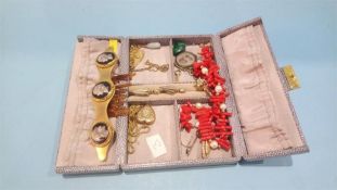A jewellery box and contents including; coral necklace etc.