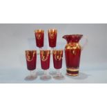 A red and gilt flashed jug and five goblets