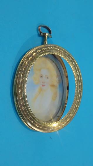 An oval Georgian miniature in the style of Paul Cosway, in ornate 22ct gold frame, makers mark - Image 2 of 2