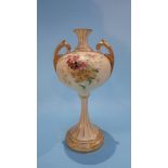A Royal Worcester vase with two gilt handles decorated with sprays of flowers, puce marks,