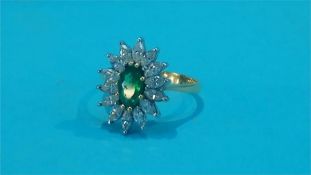 An 18ct emerald diamond ring