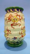 A Charlotte Rhead for Crown Ducal lobed vase, decorated with Chinese dragons and emblems, printed