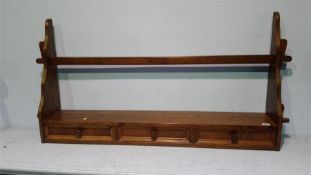An oak wall shelf, 110cm wide