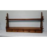 An oak wall shelf, 110cm wide