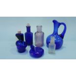 Assorted blue glass bottles