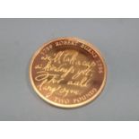 A cased 2009 £2 gold proof coin, 15.87 grams