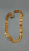 A matching 18ct gold necklace, stamped 750, weight 66.63 grams