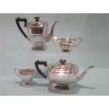A silver four piece tea set, E.H. Parkin and Co. Sheffield, 1973 (?) Approx. 48oz