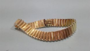 An 18ct gold bracelet, stamped 750, weight 30.3 grams