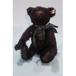 A small Steiff black bear