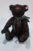 A small Steiff black bear