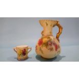 A miniature Royal Worcester loving cup and a jug (2)