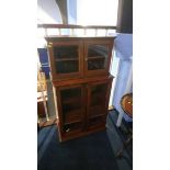 Two mahogany cabinets