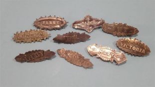 Collection of silver name brooches