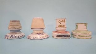 Four porcelain advertising match strikers