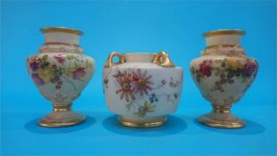 Pair of Royal Worcester blush ivory vases, decorated with flowers, 10cm and one other