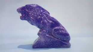 An Ashtead pottery 'Genozo' toothpaste display, in the form of a lion, with blue glaze