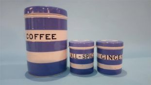 Three Cornish Ware cylindrical storage jars