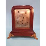 An oak cased mantel clock, with eight day movement, chiming action