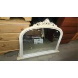 An over mantle mirror