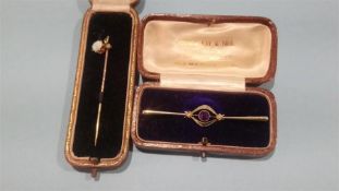 A brooch stamped 15ct and an opal mounted pin (2)