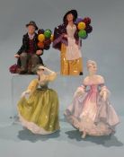 A Royal Doulton 'Balloon Man' and 'Balloon Lady' and two Doulton ladies (4)