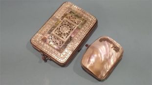 Two mother of pearl purses