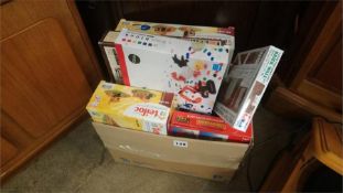 Assorted toys and model kits in one box