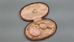 A 9ct mounted cameo brooch and pair of lorgnettes