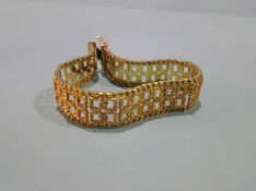 A 9ct gold bracelet, with sectional square links, weight 38.3 grams