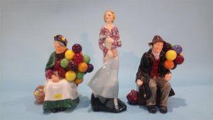 Two Royal Doulton figures 'The Balloon Seller' and 'The Balloon Man' etc. (3)