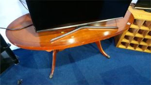 Yew oval coffee table