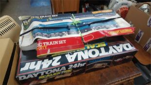 Scalextric set and a Hornby railway