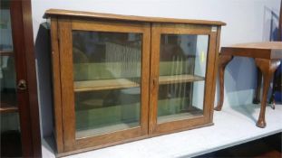 Oak glazed wall cabinet