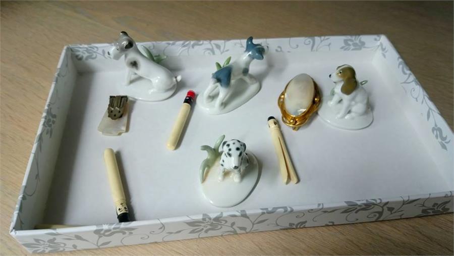 Tray of assorted including mother of pearl brooch, Metzler and Ortloff dogs etc.