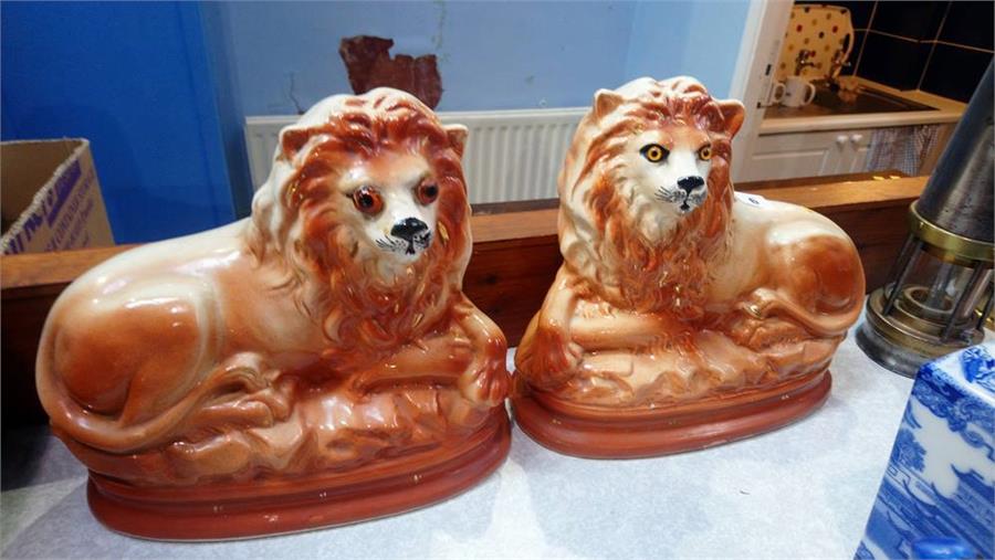 Pair of Staffordshire lions