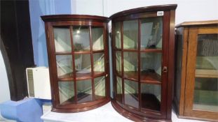 Pair of mahogany corner cabinets