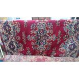 A large Persian design carpet square