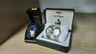Two boxed gents watches