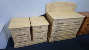 Modern chest of drawers, headboard and a pair of bedside chests